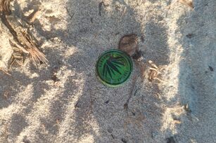 Tapa de botella verde